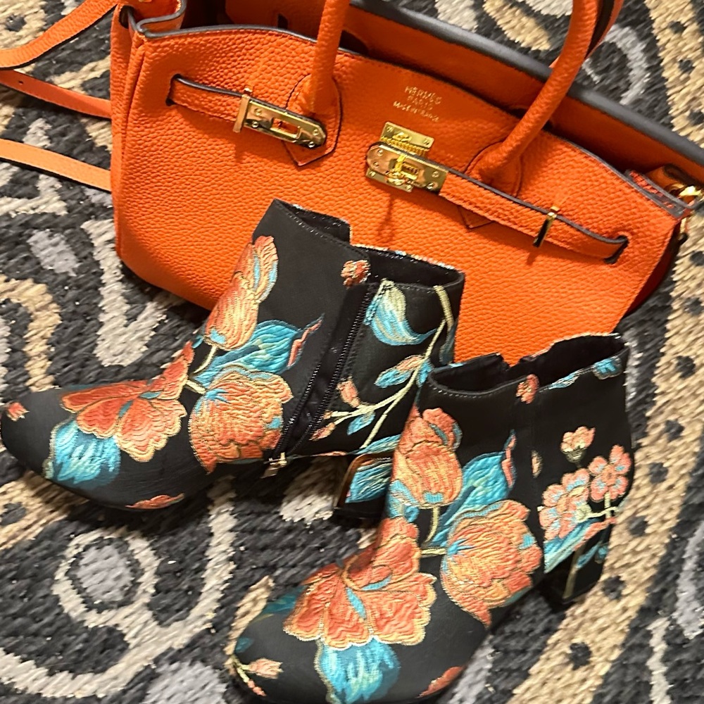 Vibrant Black and Orange Floral Ankle Boots